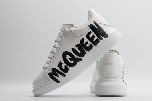 MCQ big logo white