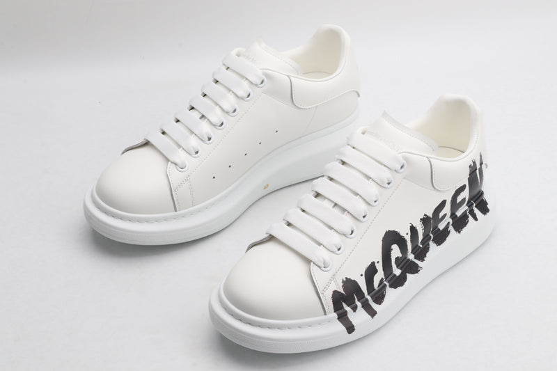 MCQ big logo white