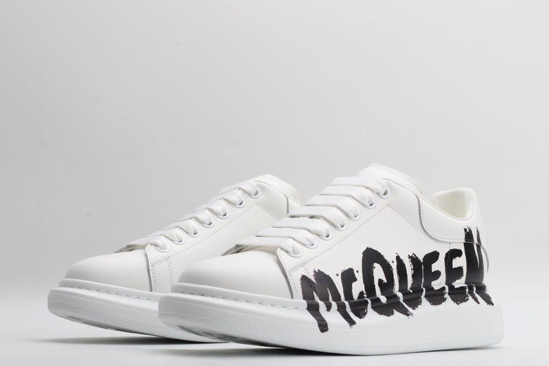 MCQ big logo white